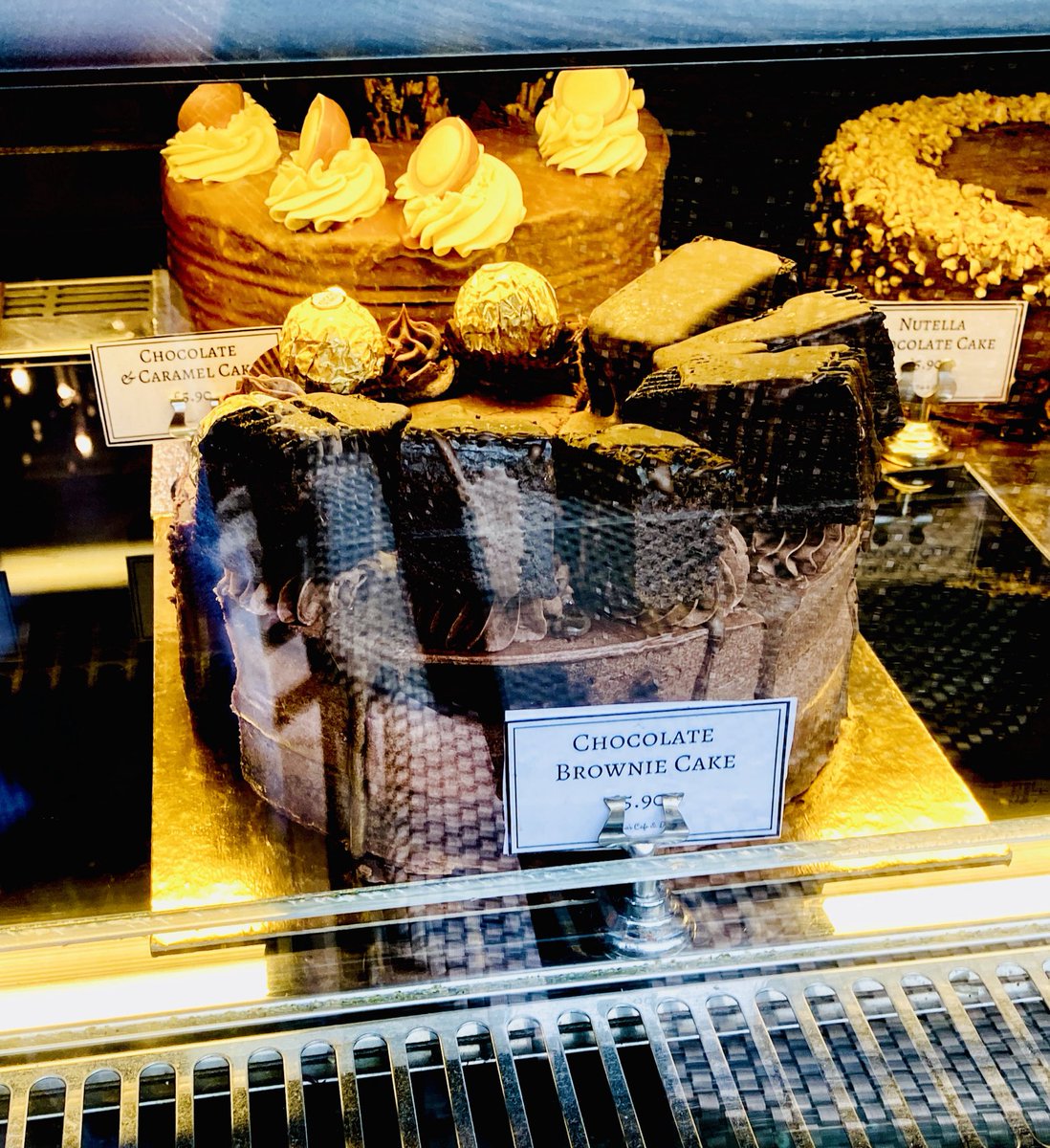 At a local patisserie… the chocolate brownie cake is a luscious chocolate cake, with entire brownies plonked on top. And I am here for it