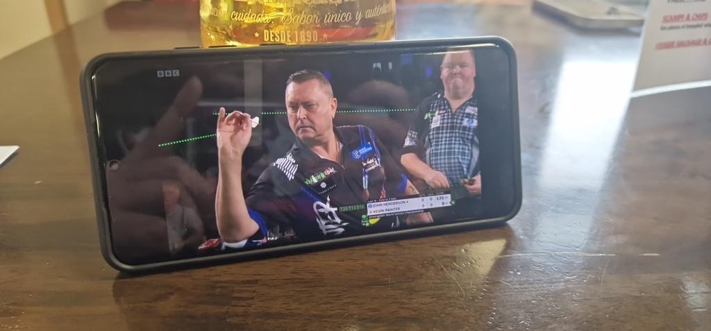 jleigh1993x's tweet photo. At Cheltenham vs Port Vale today, watching Liverpool in the bar for early ko so supporting @OfficialKP180 on @Roger180Osborne phone in the @SeniorsDarts, come on Kev!!! @JayneLoveday01 ⚽️🎯🍻🎨 #TeamArtist https://t.co/UI785N01Xg