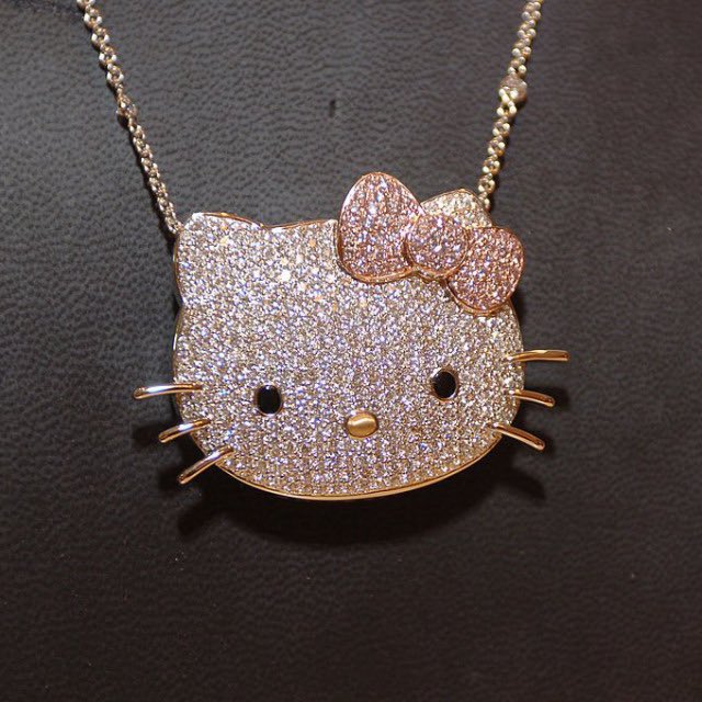 kimora lee simmons wearing a $50,000 diamond hello kitty necklace, 2005.