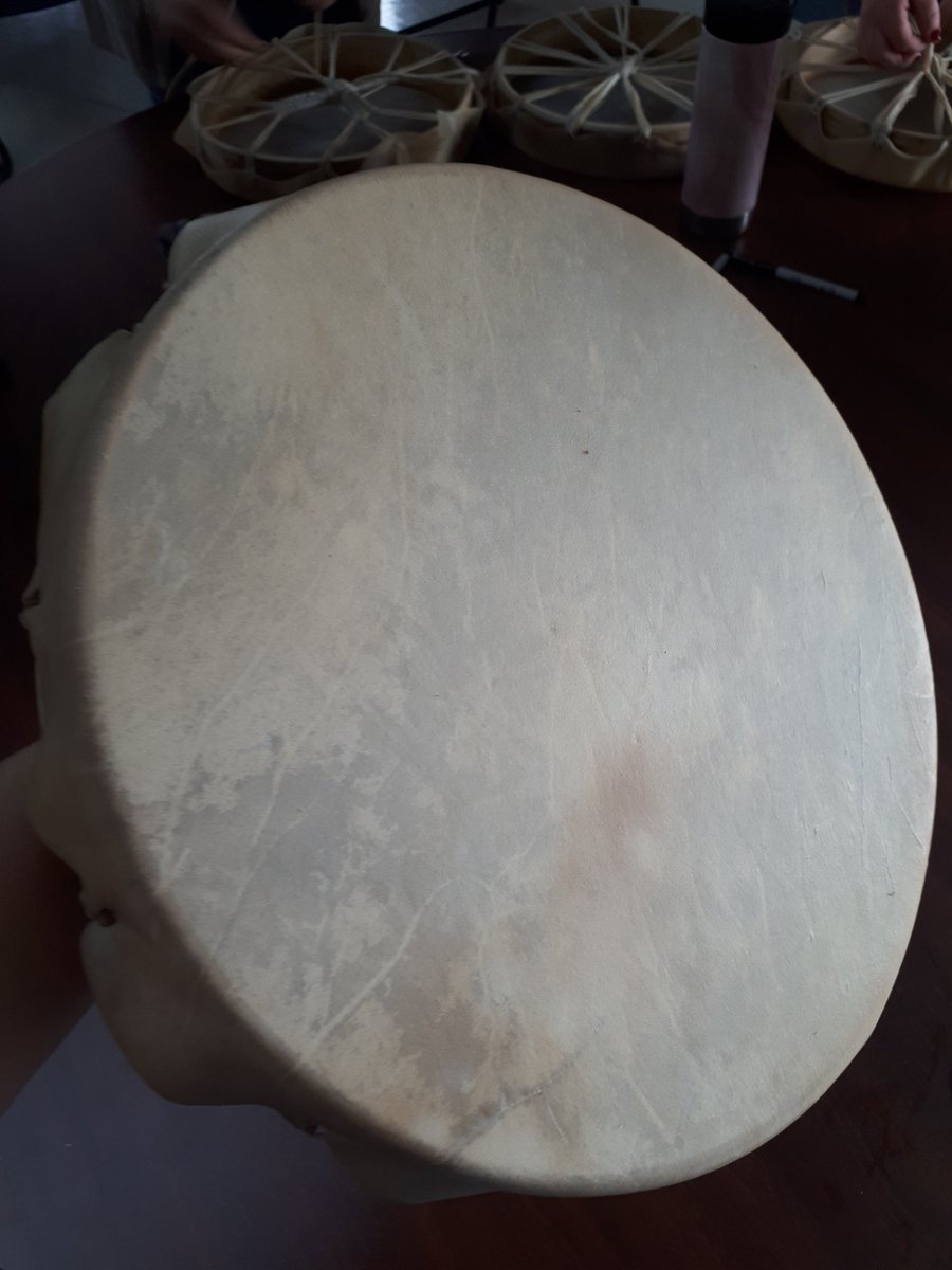 Teachers in <a href="/ASD_South/">Anglophone South School District ASD-S</a> learning together from Mi'kmaw knowledge keeper Greg Mansfield to create drums.
