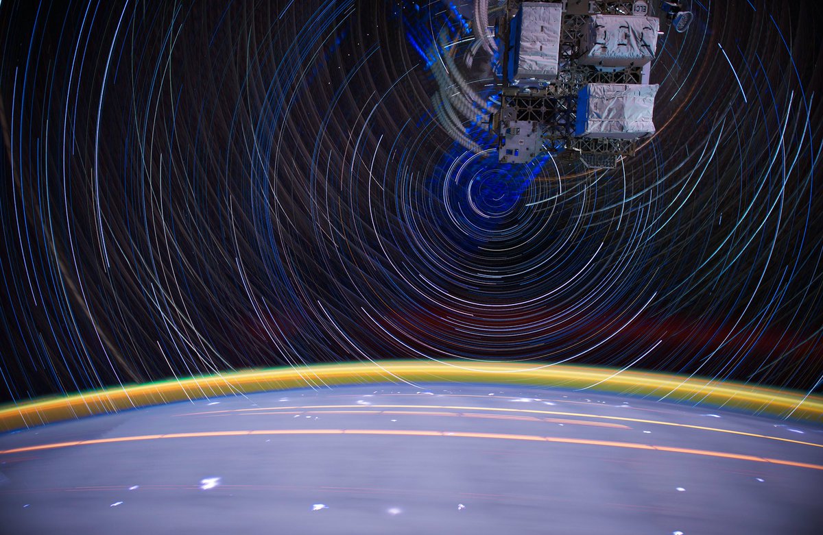 One of my sharpest star trails from space, crisscrossing the arcs of stars and the station's solar panels into one image. 30 minute time exposure composite taken from the @Space_Station , with orbital motion blurring city lights, earthly lightning storms, stars, and the solar