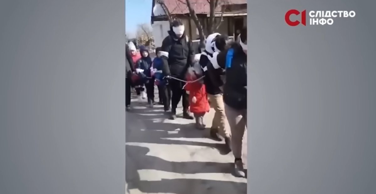 Russians are committing genocide against Ukrainians. In this shot, they are leading bound civilians, among them are children. @SpeakerJohnson are you fighting for this?