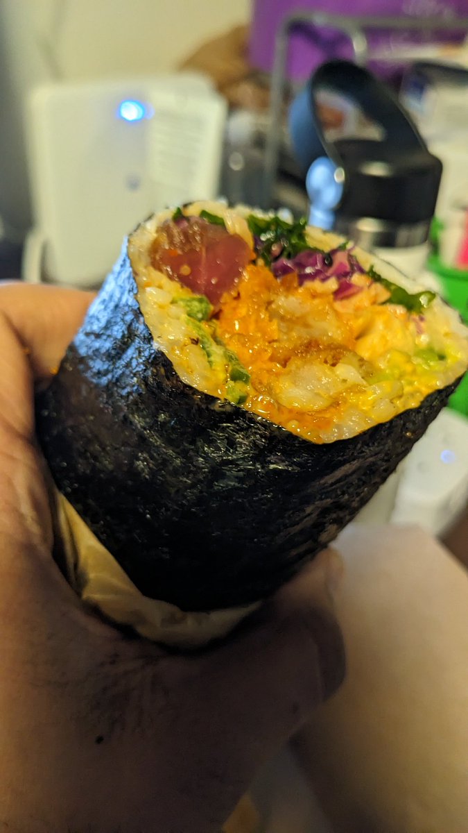 Still rolling awesome things since 1993. Shoyu Tuna, Tempura Shrimp, Tempura Crunch, Ginger, Avocado, Kale, Red Cabbage, Sesame Seeds, Wasabi Aioli, Spicy Mayo, Eel Sauce, Masago, Jalapeno, White Rice washed with Sushi Vinegar on a Seaweed Wrap in the form of a Burrito. Venus Joy