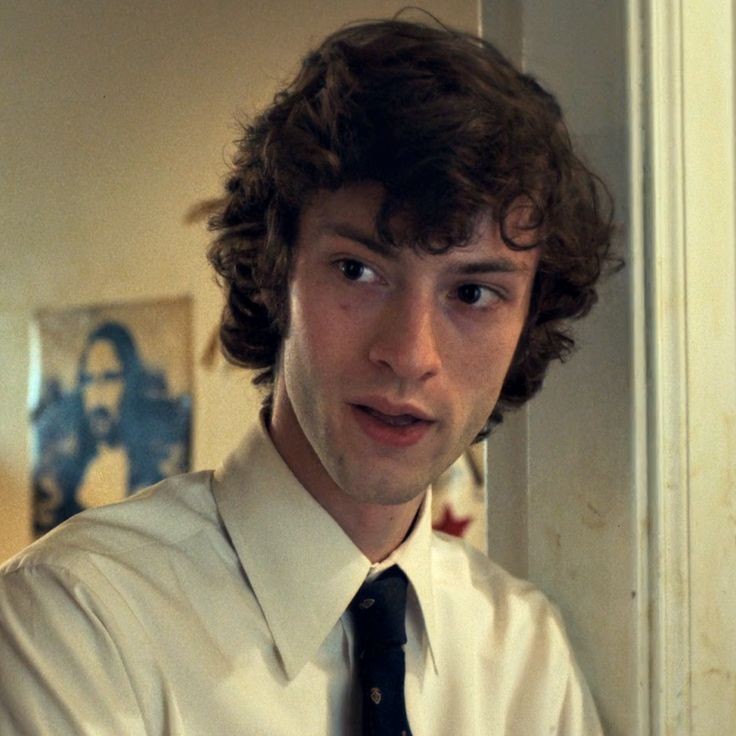 He looks like if snoopy wished to become a human boy