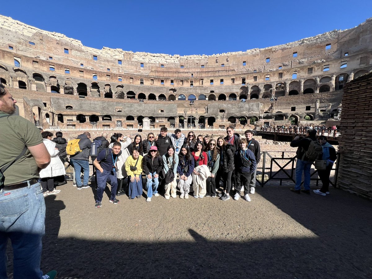 CoachTurkOHS's tweet photo. Day 2 - can’t wait to edit this guy out of the group photo. Thanks green shirt. Amazing food and gelato keep us going. Can the cafeteria start serving gelato? I think it would sell pretty well. @OSchoolsPR @TeachMitch @DianeProvvido https://t.co/La6iHPT7Al