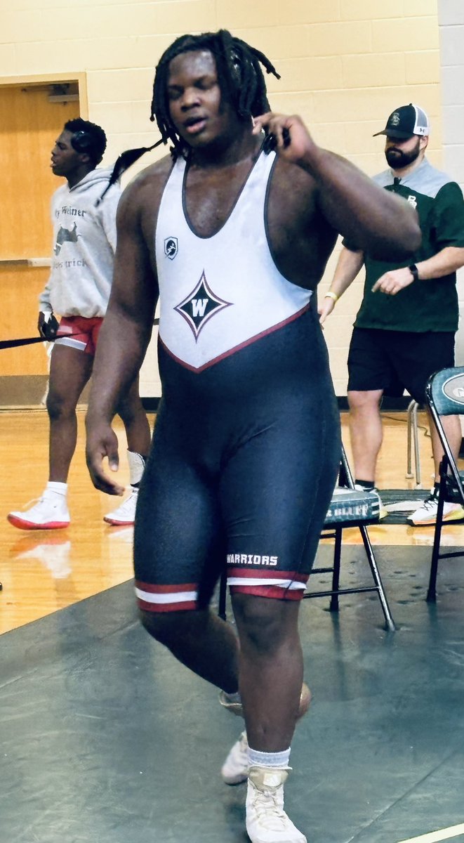 Bear hugging the Bear! Corey Deas Jr. is headed to State! Way to go big man!
