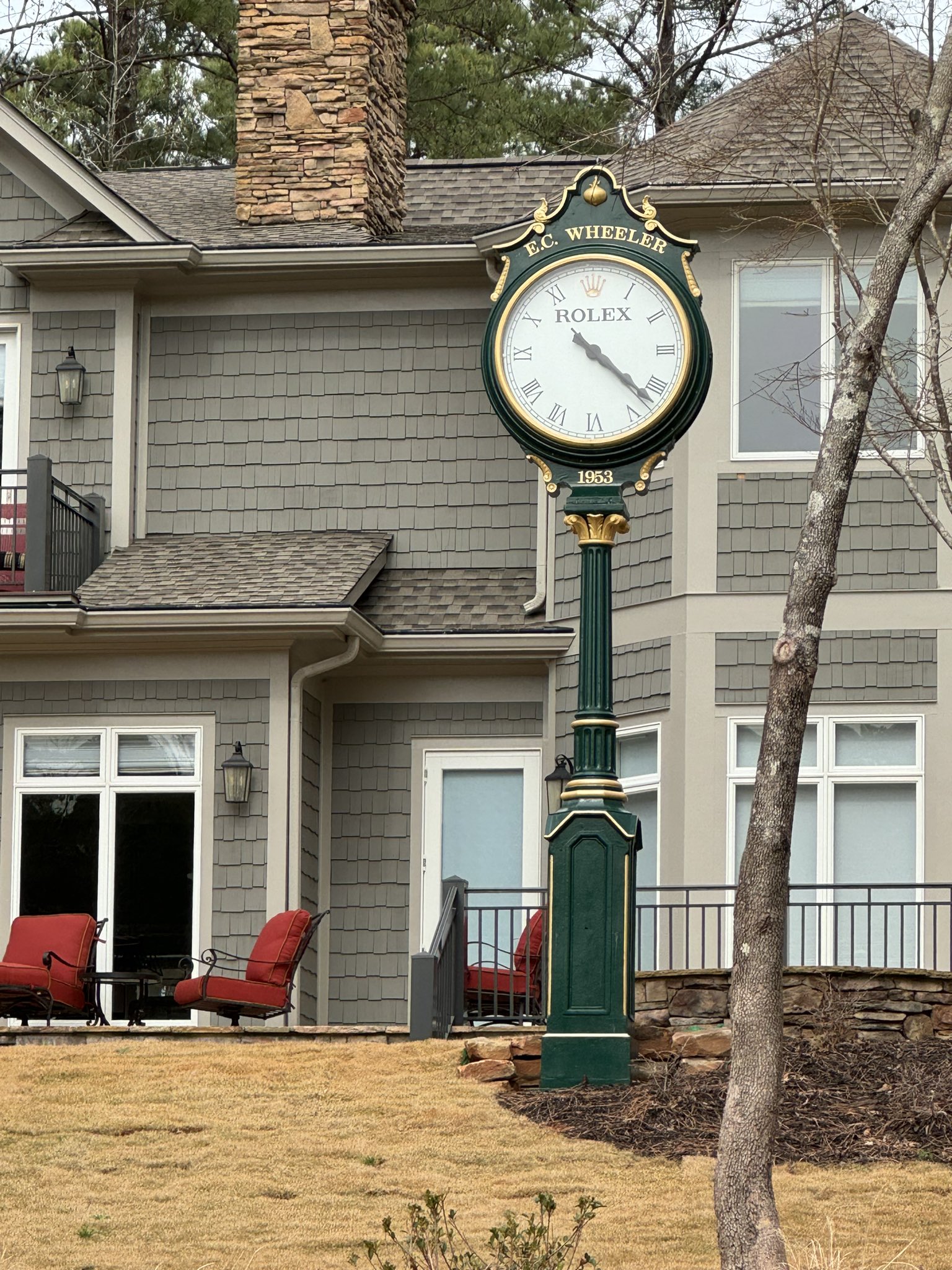 Bryan on X Also who puts a Rolex clock in their backyard on a golf course https t 6UOuLbjJH2 X