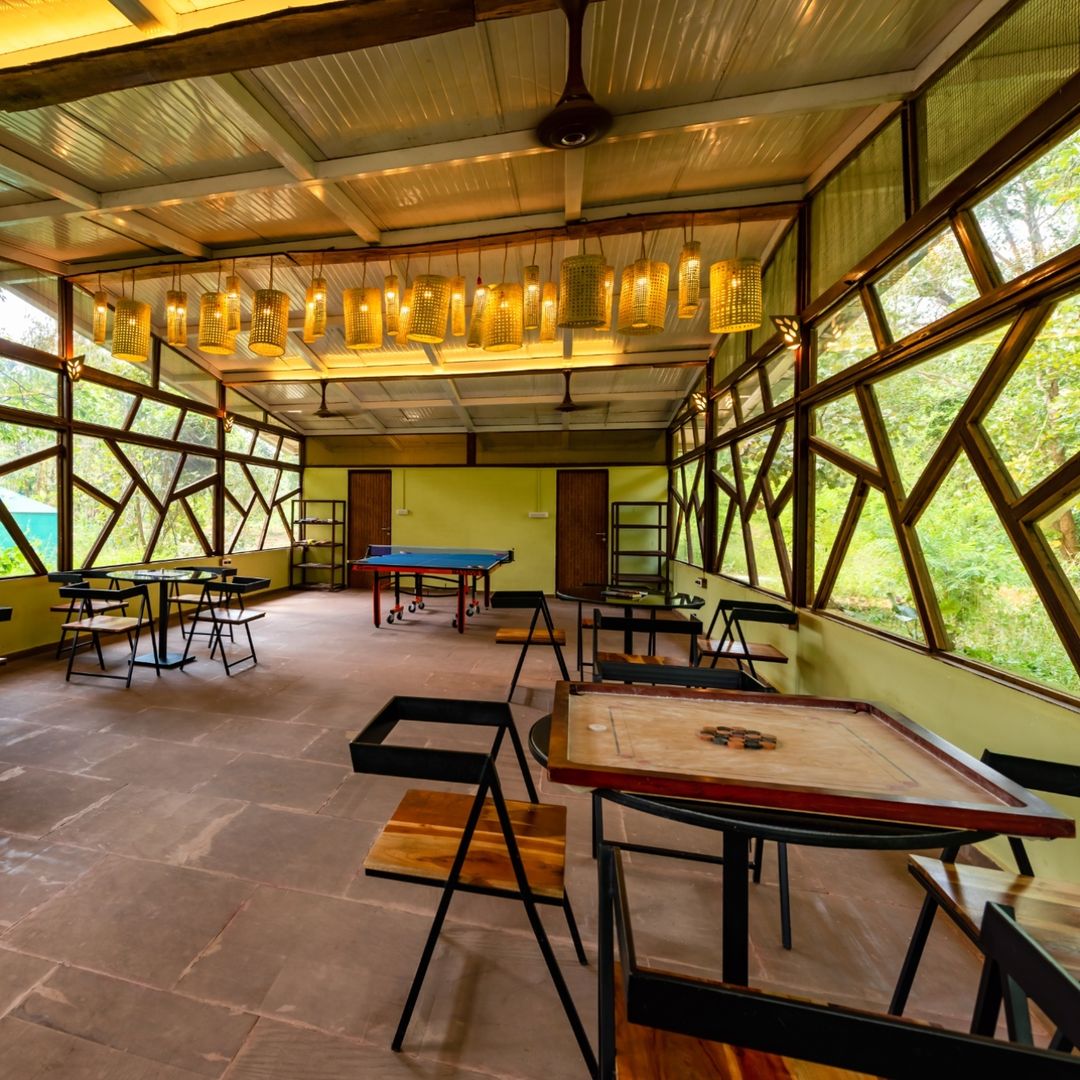 Experience wild gameplay at Kanha Jungle Camp! From indoor chess to outdoor badminton, immerse yourself in nature's playground. Book now: connect@junglecampsindia.com | +91-9999742000 #NatureGames #AdventureAwaiting