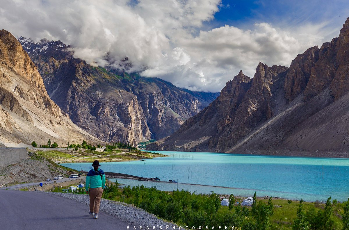 A Foreigner on KKH witnessing beautiful Attabad Lake, Gojal GB, Pakistan This was 2016 when we had less no of hotels around the lake with green belt, the speed of construction around the lake will lead to limited time tourism in the area. #asmarsphotography