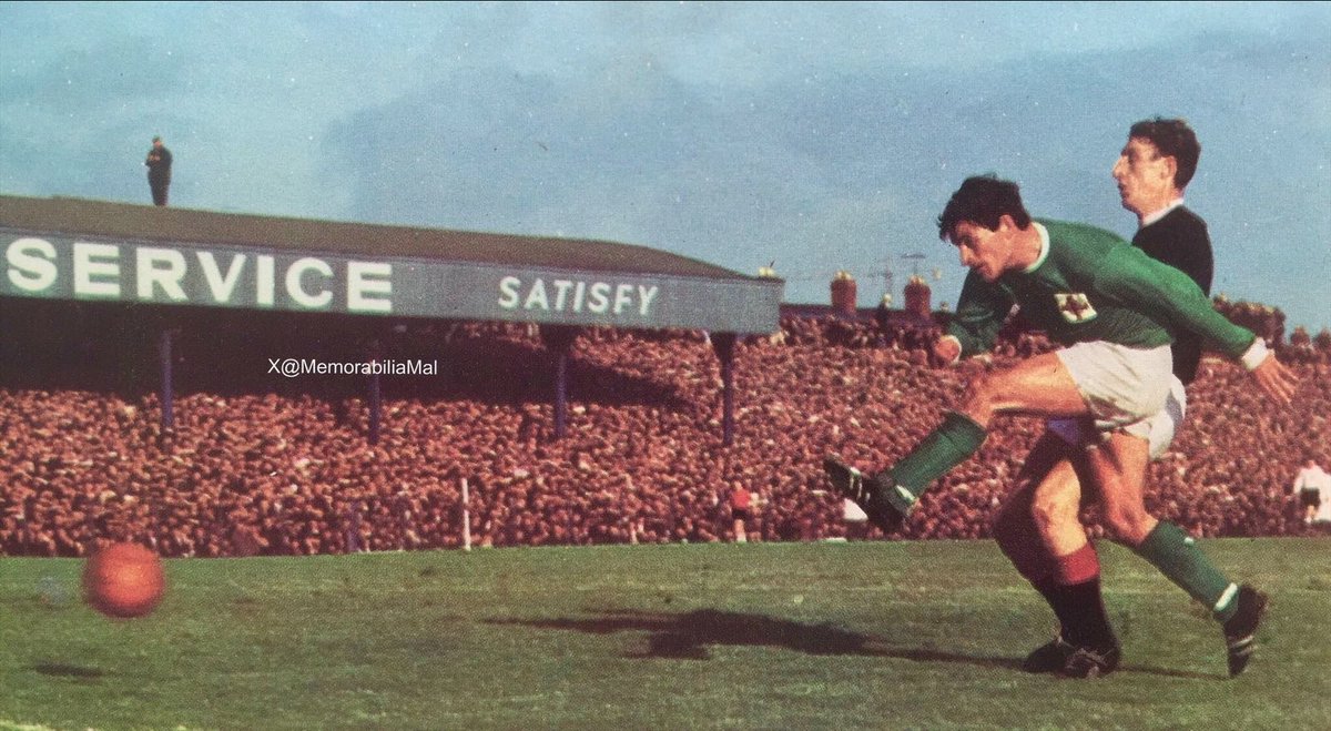 That bloke on the roof again…
Johnny Crossan of Northern Ireland gets his shot away despite the attention of Scotland’s Tommy Gemmell at Windsor Park 21/10/67 #GAWA