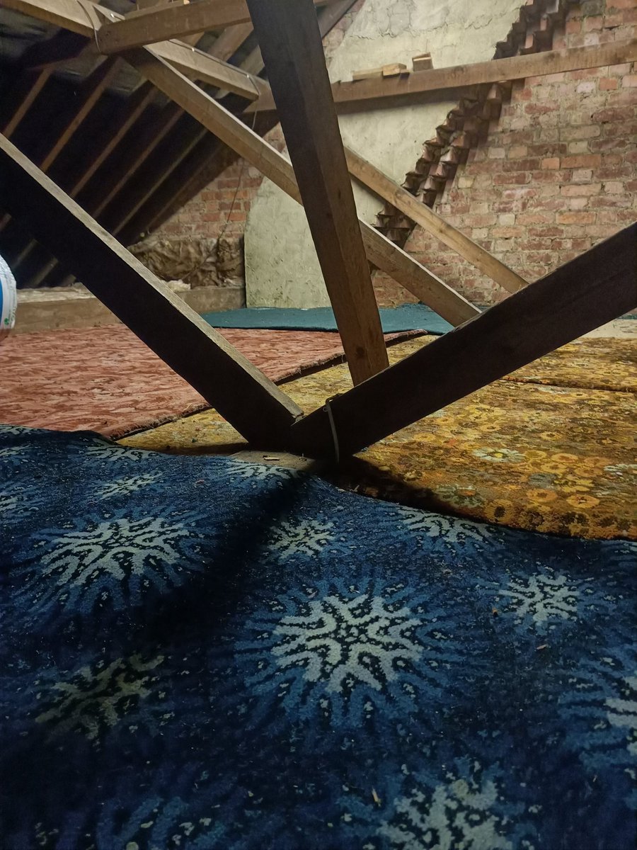A nose around my mum's house revealed that the former owner's eccentric taste in carpets extended into the attic.