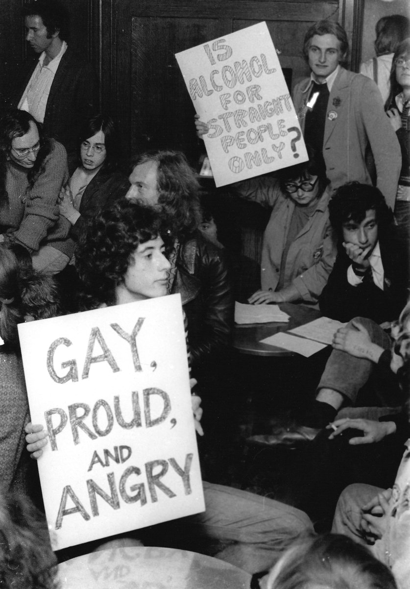 PeterTatchell's tweet photo. #LGBTHistoryMonth: In early 1970s, some pubs refused to serve "queers" &amp; "lezzos". I helped organise Gay Liberation Front sit-ins. Police evicted us but we kept coming back &amp; eventually those businesses ended their gay bans. Me in the photo at west London pub The Chepstow 1971 https://t.co/t3lZjYKspB