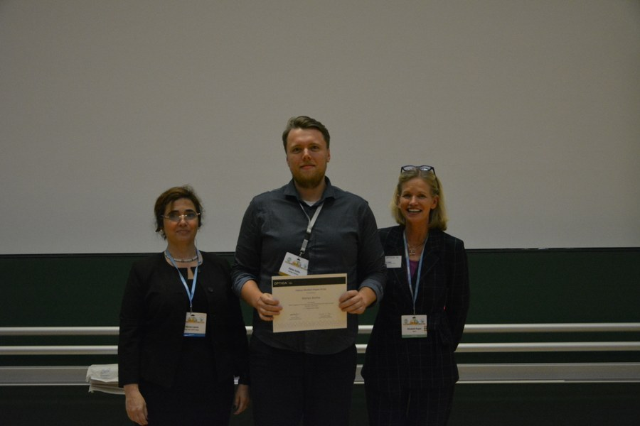 ICO-25: Karl Leo and Juergen Czarske, Kent Rochford (CEO SPIE, the international Society for Optics and Photonics), Liz Rogan (CEO OPTICA, The Society Advancing Optics and Photonics worldwide)