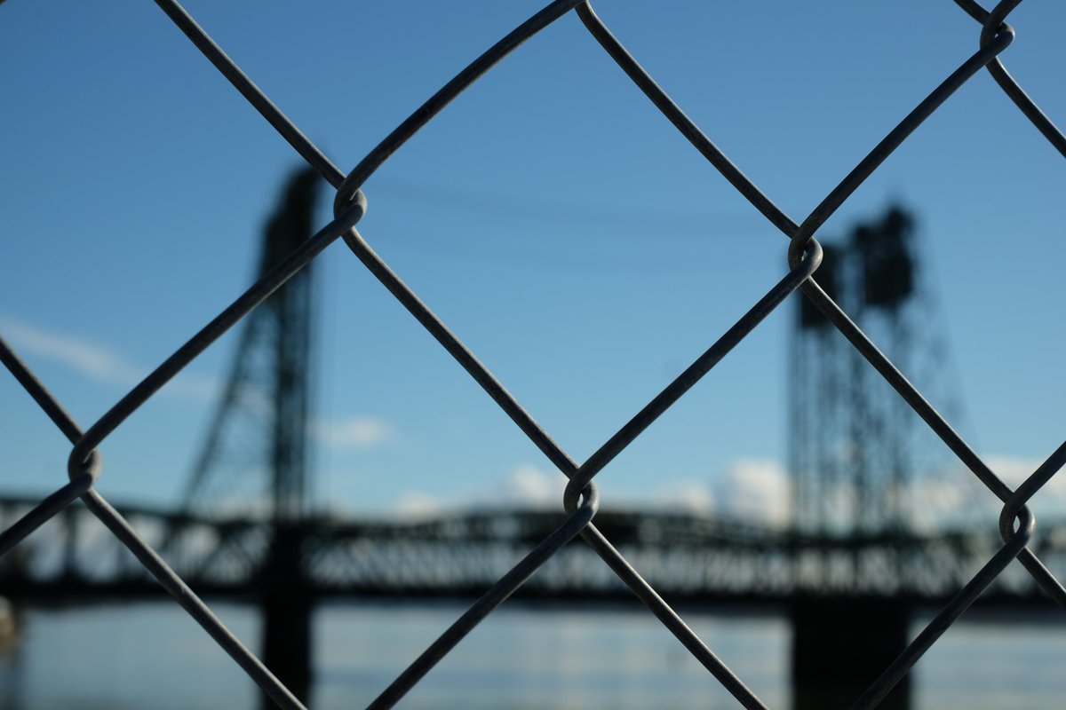 Vancouver, Washington, USA - Saturday, February 3, 12:52 PM. #Vancouver #Washington #USA #PacificNorthwest #VancouverWaterfront #Fence #Interstate5Bridge #BlueSky #アメリカ #橋 #青空