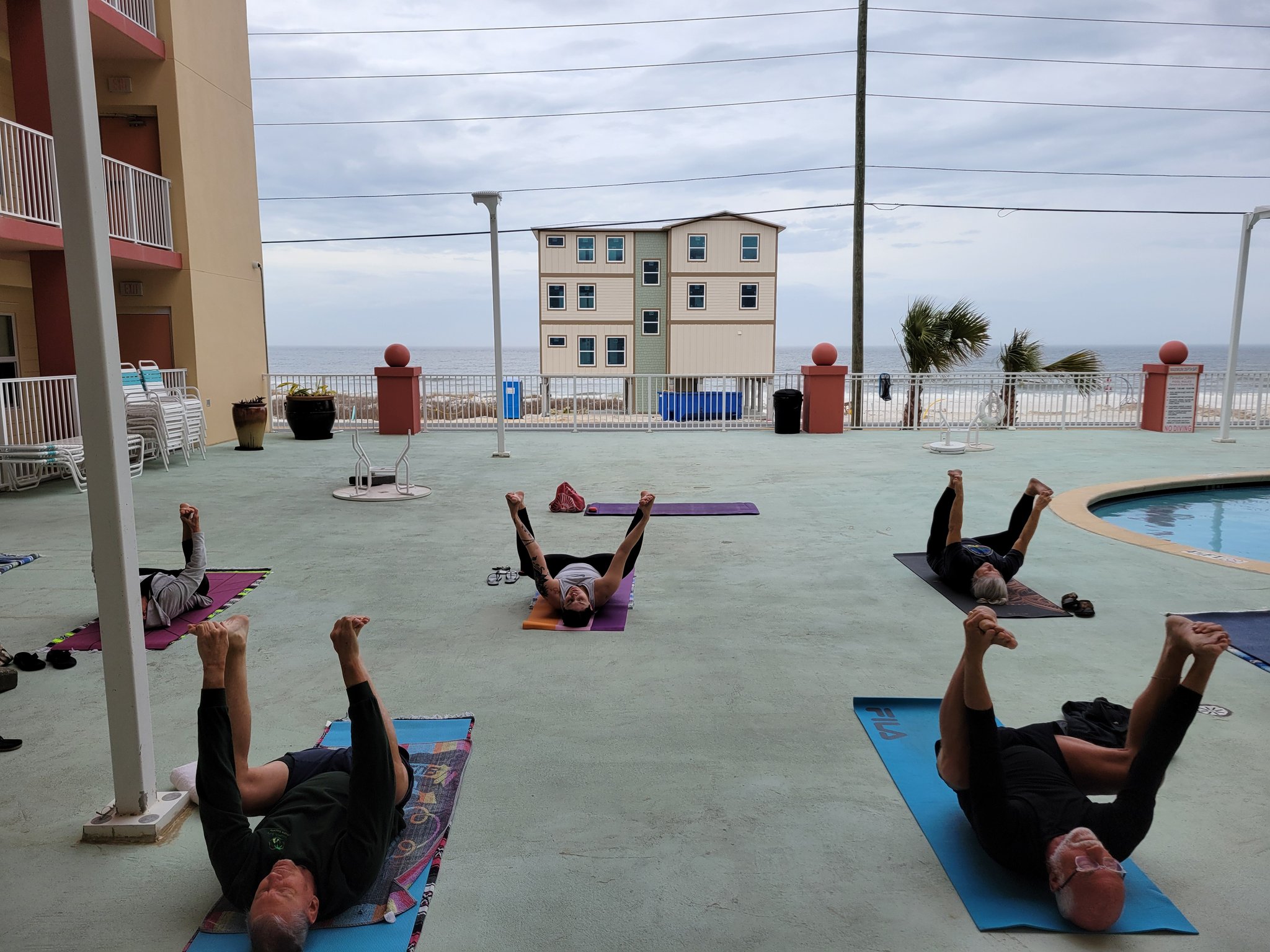 Mexico Beach FL Yoga on X: Try Happy Baby pose @ Sunday Beach
