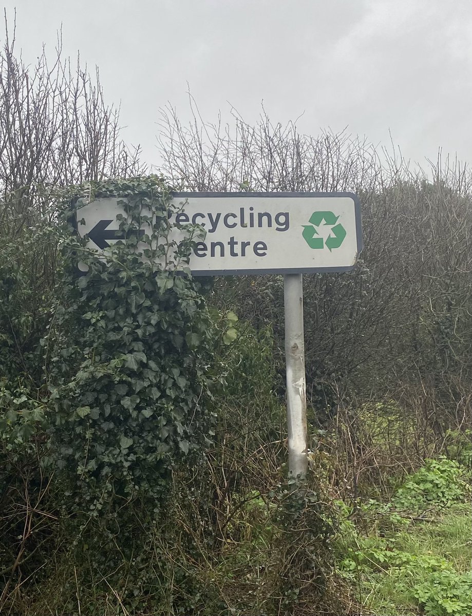 Sign being recycled at recycling plant.