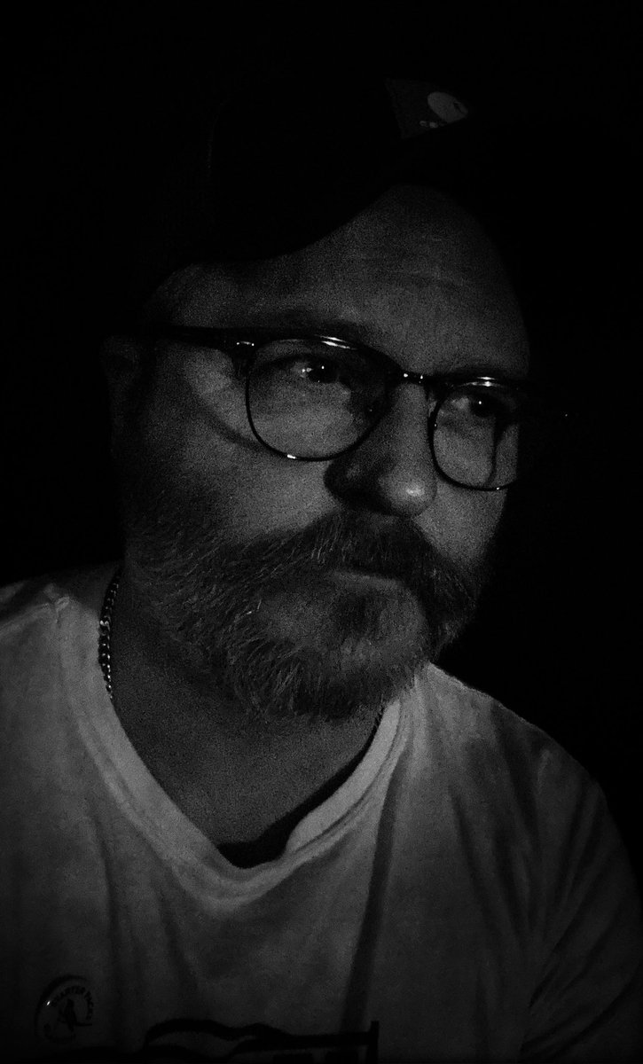 The face of a man who is in a songwriting mode. Or is just gassy, maybe the latter.