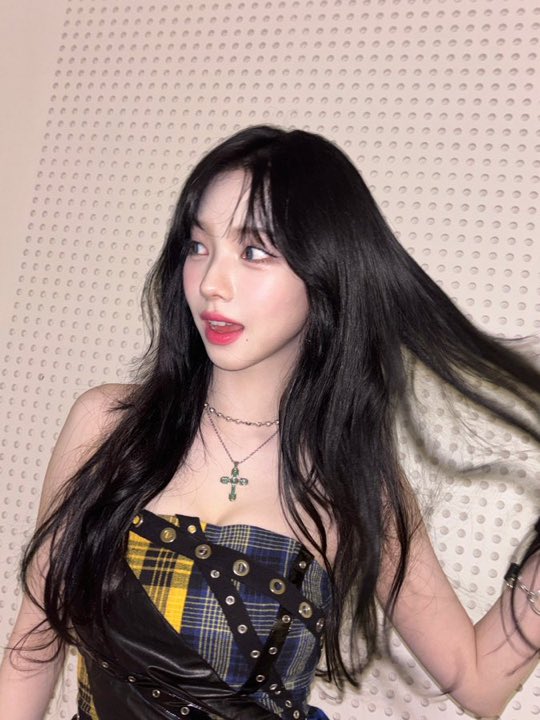 there she goes wearing that cross necklace again while seducing women