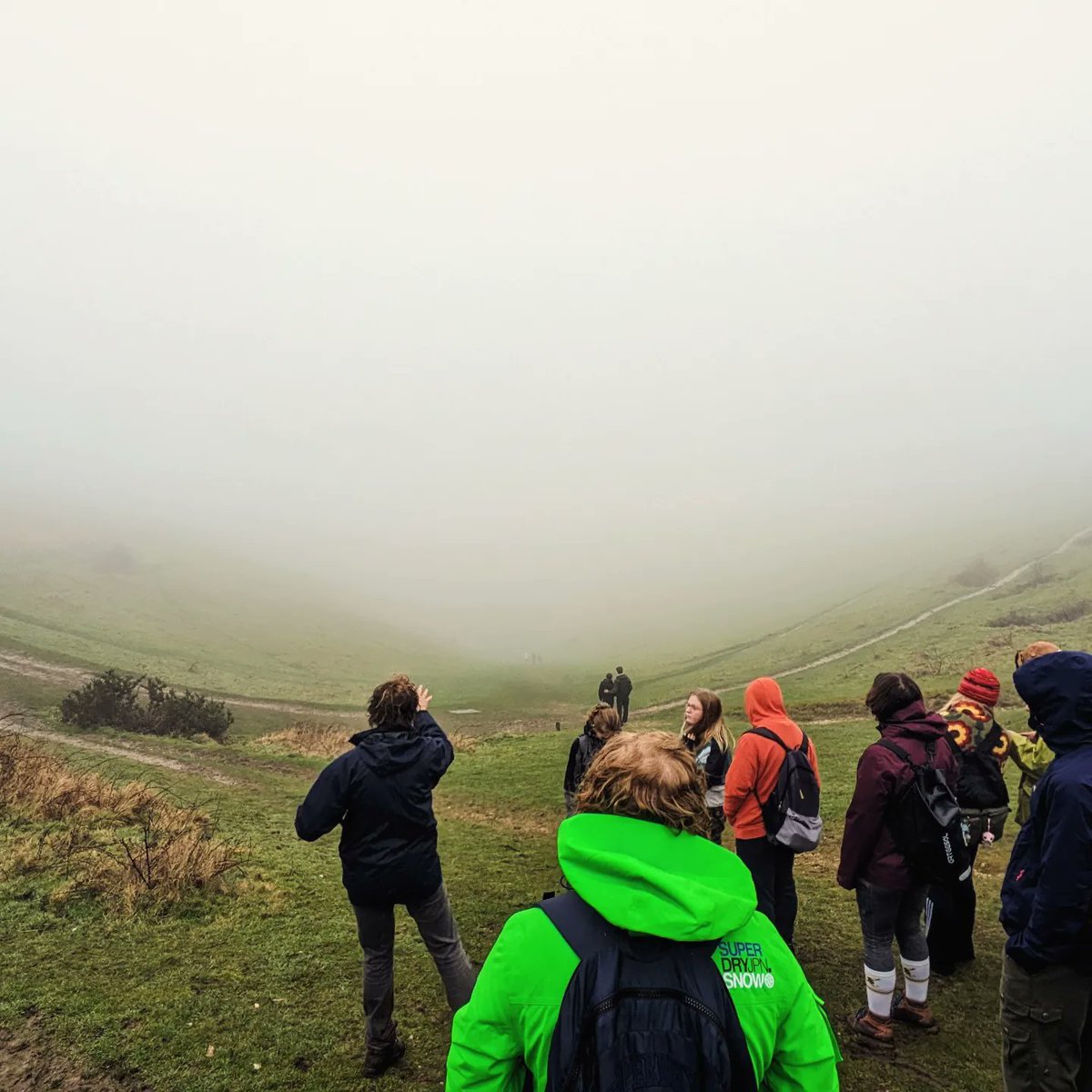 BrightonUniGeo's tweet photo. Weekend social trip up to explore Devil's Dyke just outside of Brighton! Despite the weather we learned a lot about the history and nature of the area thanks to our @nationaltrust guide, &amp; managed to elude the mysterious cow that stalked us through the mist... 🐄 https://t.co/YuMC9uQNWH
