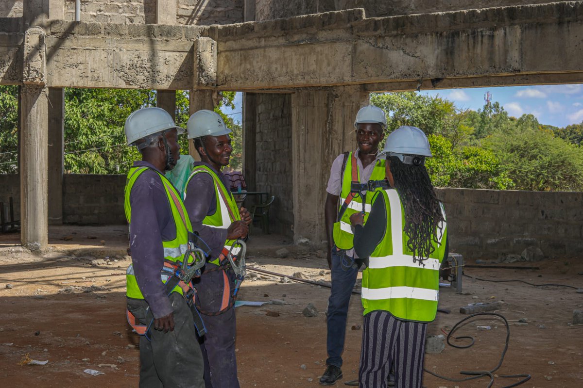 Witness the culmination of AIC Wote's roof with the installation of a majestic cross, adding divine grace to Wote, Makueni County's landscape. Follow our journey of structural excellence and architectural beauty. #AICWote #RoofConstruction #MakueniCounty #KenyanArchitecture