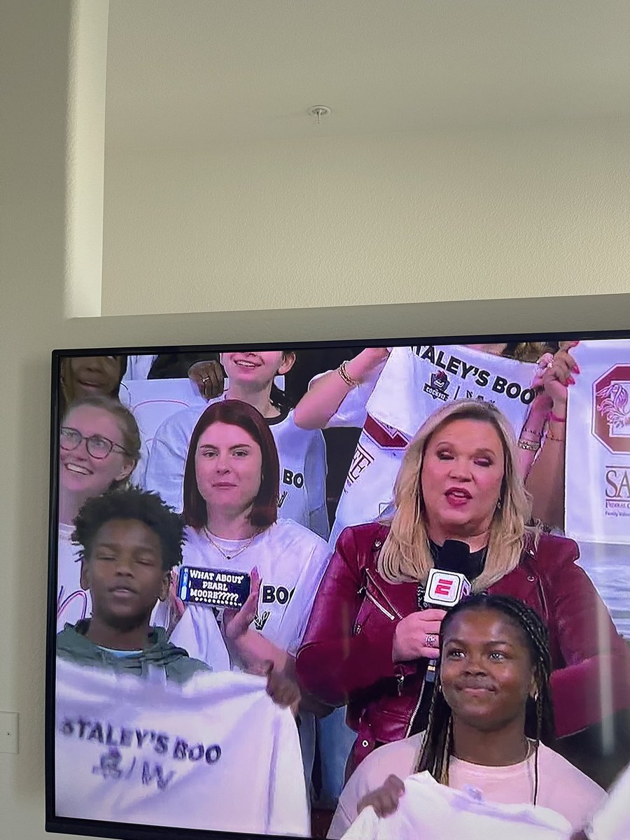Hahaha. Look at her phone. 

“What about Pearl Moore?” 

Moore scored 4,061 points while playing for Francis Marion University.