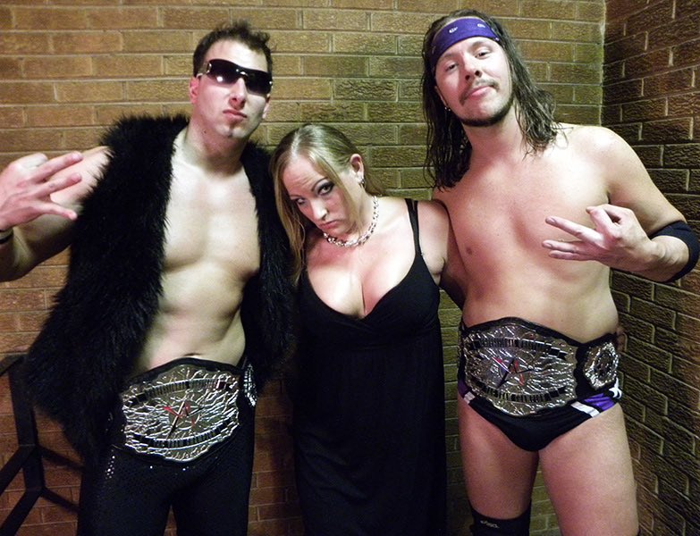 AAWPro's tweet photo. Celebrating 20 years of AAW as we look  to our history and revisit the memorable moments &amp; champions over the years.

Former AAW Tag Team Champions - The Awesome 3some: Jordan McIntyre &amp; @knightwagner w @Eryn09

Join us at LEGACY on 2/23/24 for #AAW20!

🎟️ https://t.co/9glYmjydOU https://t.co/G6utyyq2ac