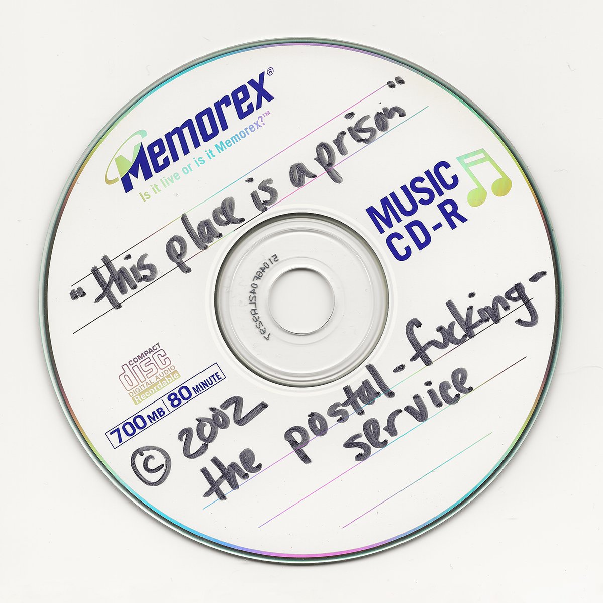 'Give Up' is officially old enough to drink. It was released 21 years ago today, February 18, 2003. These are a few of the CD-Rs and envelopes that Ben and <a href="/jimmytamborello/">Dntel</a> exchanged through the mail while creating the album.