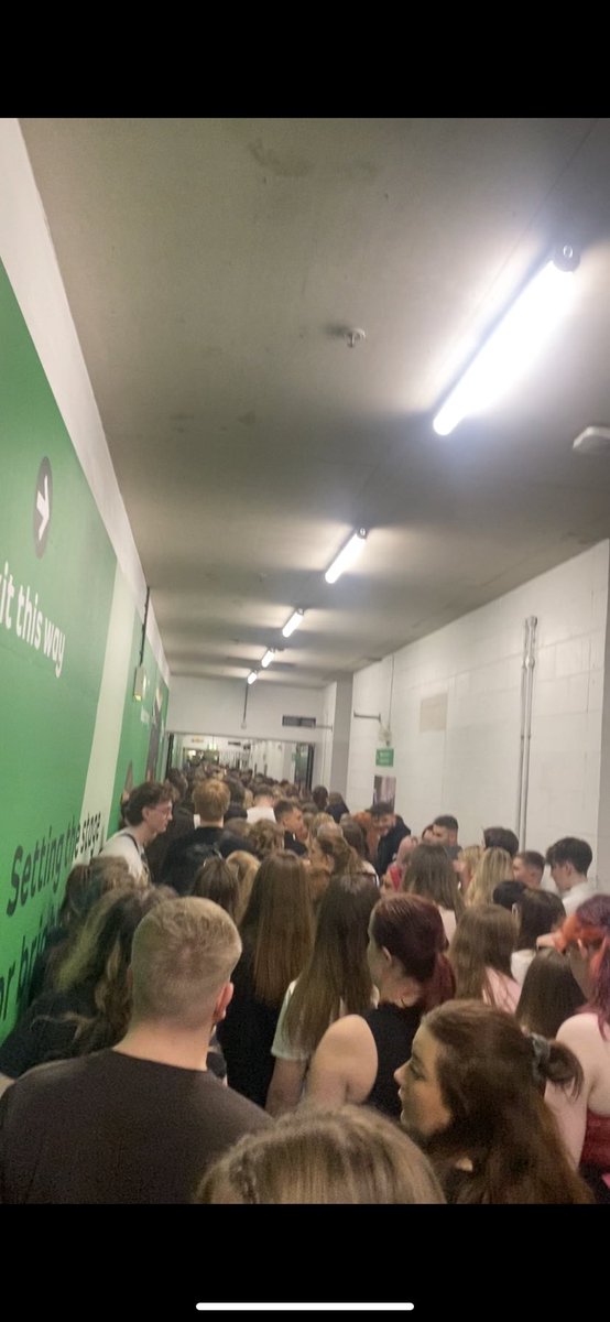 jendoesux's tweet photo. @AOArena what a fucking disgrace. Emergency exits completely blocked, thousands of people trapped in a small tunnel and some are passing out. Sort it out. https://t.co/1Bdu1szS3E