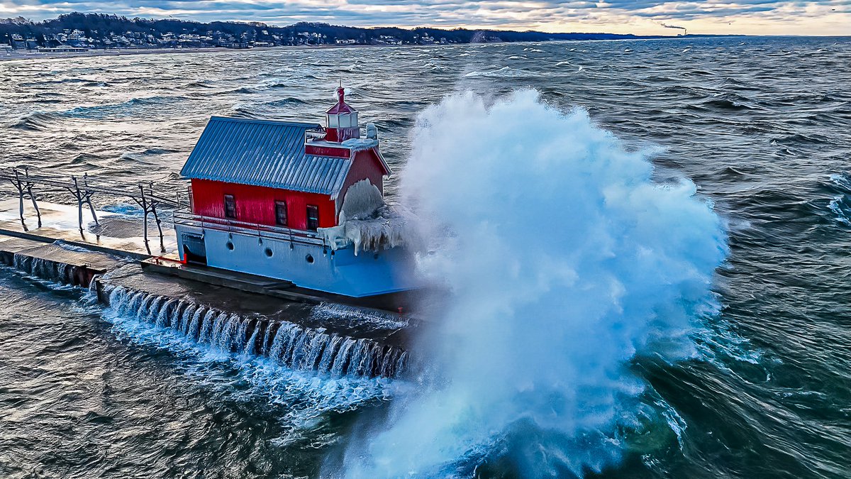 🌊 Wow! Lake Michigan is truly amazing! Check out this lighthouse in Grand Haven, Michigan getting completely covered by a massive wave. Nature's power is on full display! 🌅 #LakeMichigan #GrandHaven #NaturePower #Lighthouse #WaveWatchers 😲🌊🏞️ Taken this morning on 02/18/24.