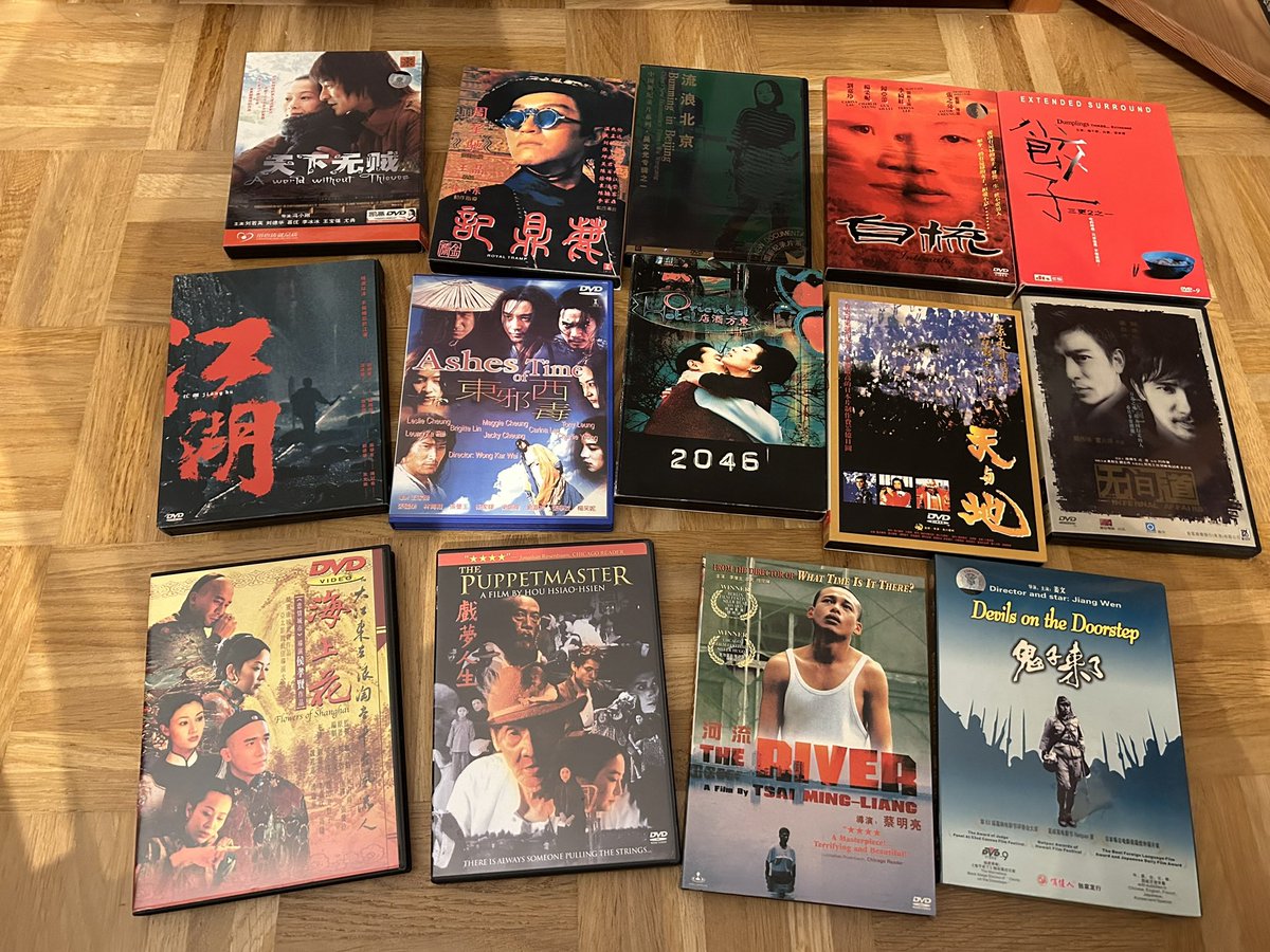 BridgeWeShall's tweet photo. A tiny fraction of husband’s DVD collection. He has enough for at least one semester of East Asian Cinema. I am less familiar with the Taiwanese and Japanese titles im his collection. Will slowly explore now that they have come out of grandma’s attic. https://t.co/mBeQuCSPIJ
