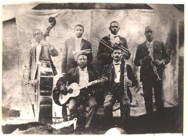 This is the only known photo of #BuddyBolden to exist, pictured with his band circa 1905. He is standing in the back row holding the cornet. 

He is regarded as a key figure in the development of a New Orleans ragtime music, or 'jass', later known as jazz.  

#BlackHistoryMonth