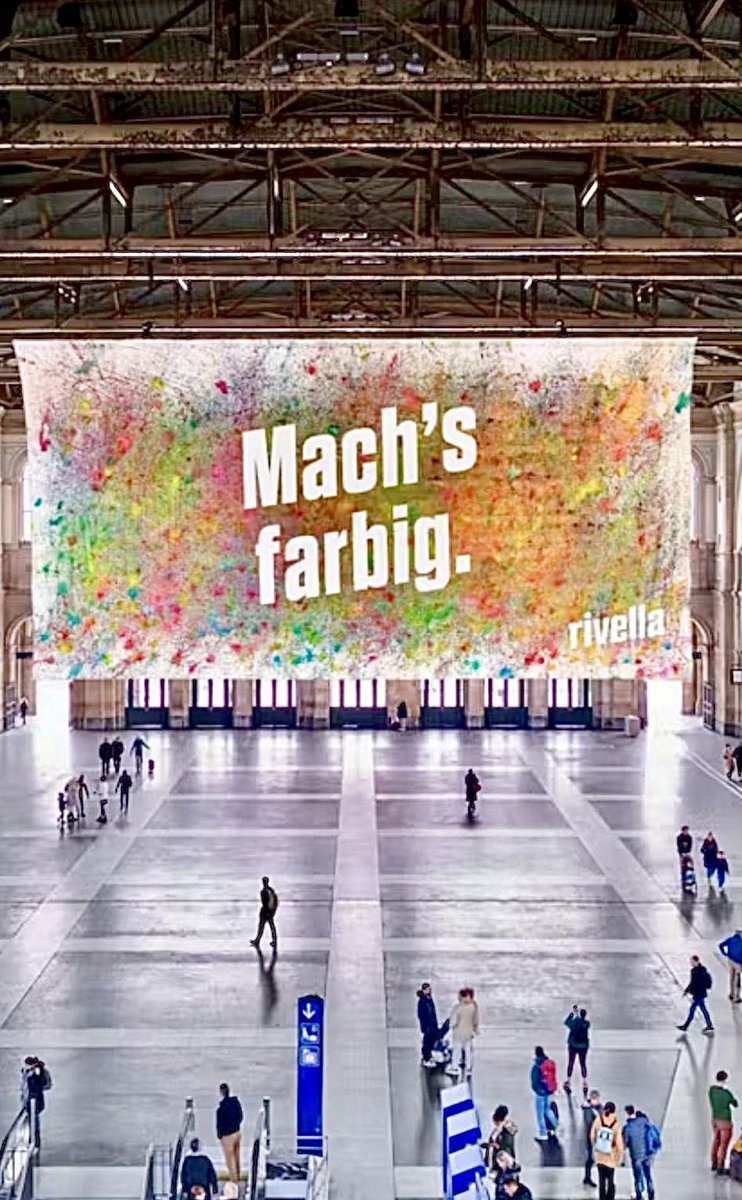 LiamRudden's tweet photo. Just been sent this by my pal Vivi. This picture hangs in Zurich’s main station - passers by were able to throw colored balloons at the canvas to create this large picture. Amazing public art. Could we try this at @NetworkRailEDB do you think?
#MakeItColourful #MachsFarbig https://t.co/ifx8hAUYER