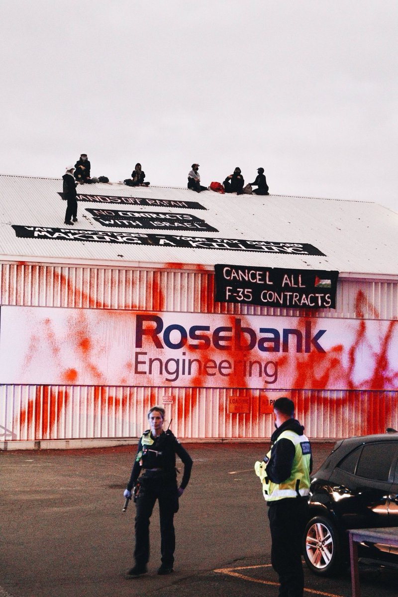 akaWACA's tweet image. Over 2 hours so far on the roof of Rosebank Engineering. We understand that the F-35 parts manufactured in this factory are critical to the operation of the F-35 Joint Strike Fighters and that without them the F-35s would be unable to release bomb payloads. 
#StopArmingIsrael