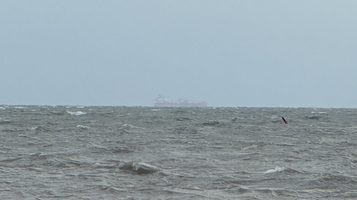 AlJDugan's tweet image. That is the CCGS Griffon, 9.7km away on a rough Lake Erie. It’s barely visible to the naked eye, but my #iPhone14 at 15X zoom managed to pick it out! Remarkable! I didn’t enhance the image. I don’t think they are laying any buoys today. #ShipTracking #LakeErie #Weather
