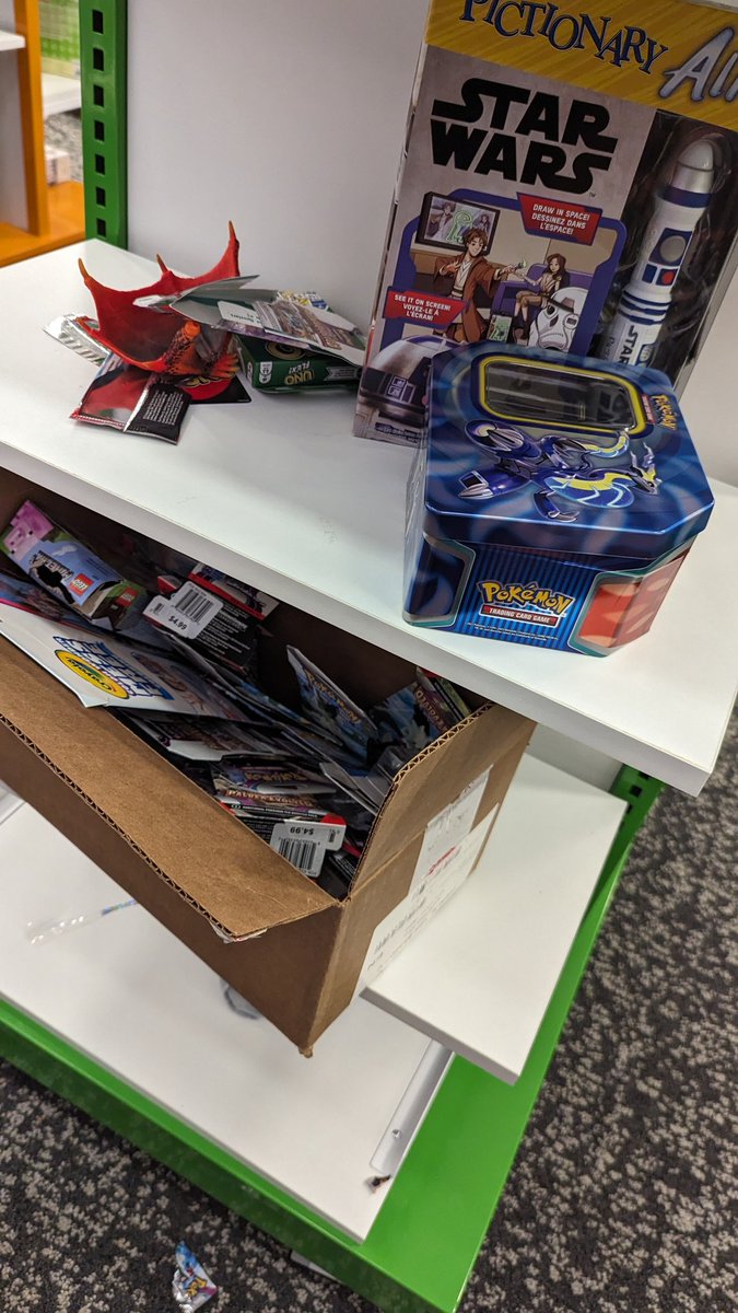SystemDraco's tweet photo. Found another Pokewalker in a box of Skylanders from our parents house... The tag is still in it 😭

Also went to the mall, someone tore through a shipment box of Pokemon cards and took a bunch of em, leaving the wrappers and commons :/ some people man

-Blue https://t.co/6ZXc5f6fbf