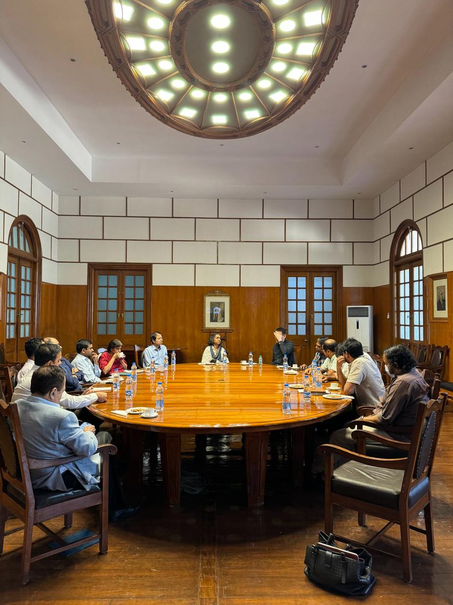 Dr. John Jumper with heads of departments and other senior faculty in the Council Chamber at the Indian Institute of Science (IISc). Professor Usha Vijayaraghavan, Dean, Division of Biological Sciences, is chair at this meeting. #tnqdistinguishedlectures2024
