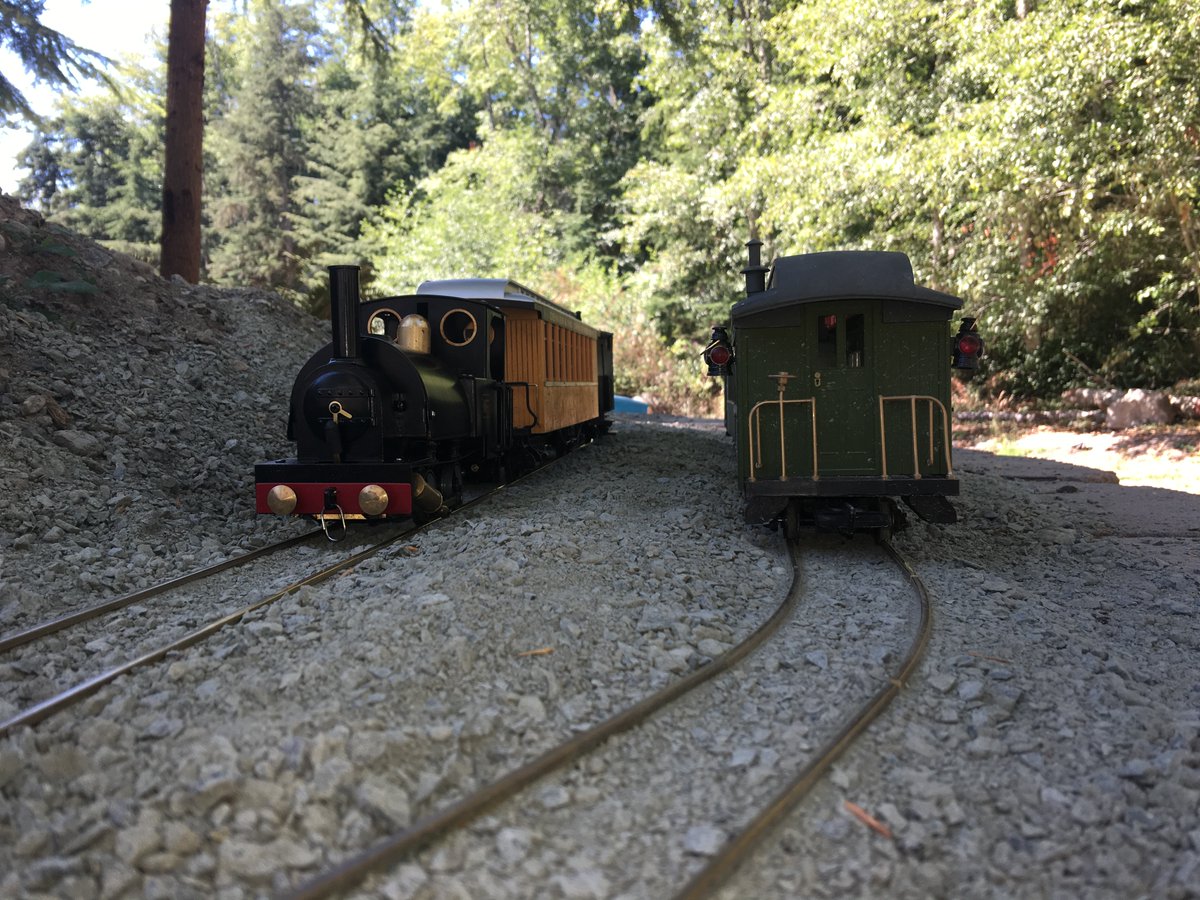 Before we moved, we transformed a mound of dirt into a a #GardenRailroad with a 74-foot loop of track. It was a fun #DIY project but I hated moving the wall blocks! Can't wait to build a bigger layout in our new backyard. #ModelTrains #LandscapingGoals #Gscale #landscaping