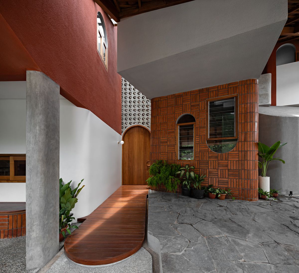 Architizer's tweet image. Inspired by the client's desire for a "messy design," this home embraces a unique layout for communal living. It pays homage to vernacular architecture, utilizing natural materials &amp;amp; featuring a standout joglo roof design.

Details: arc.ht/3wufW6o | 📍Jakarta, Indonesia