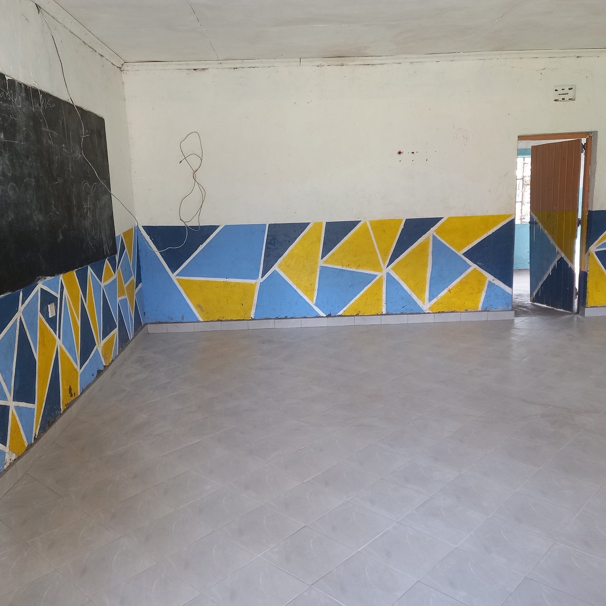 Floor at Matumaini tiled, great work!
