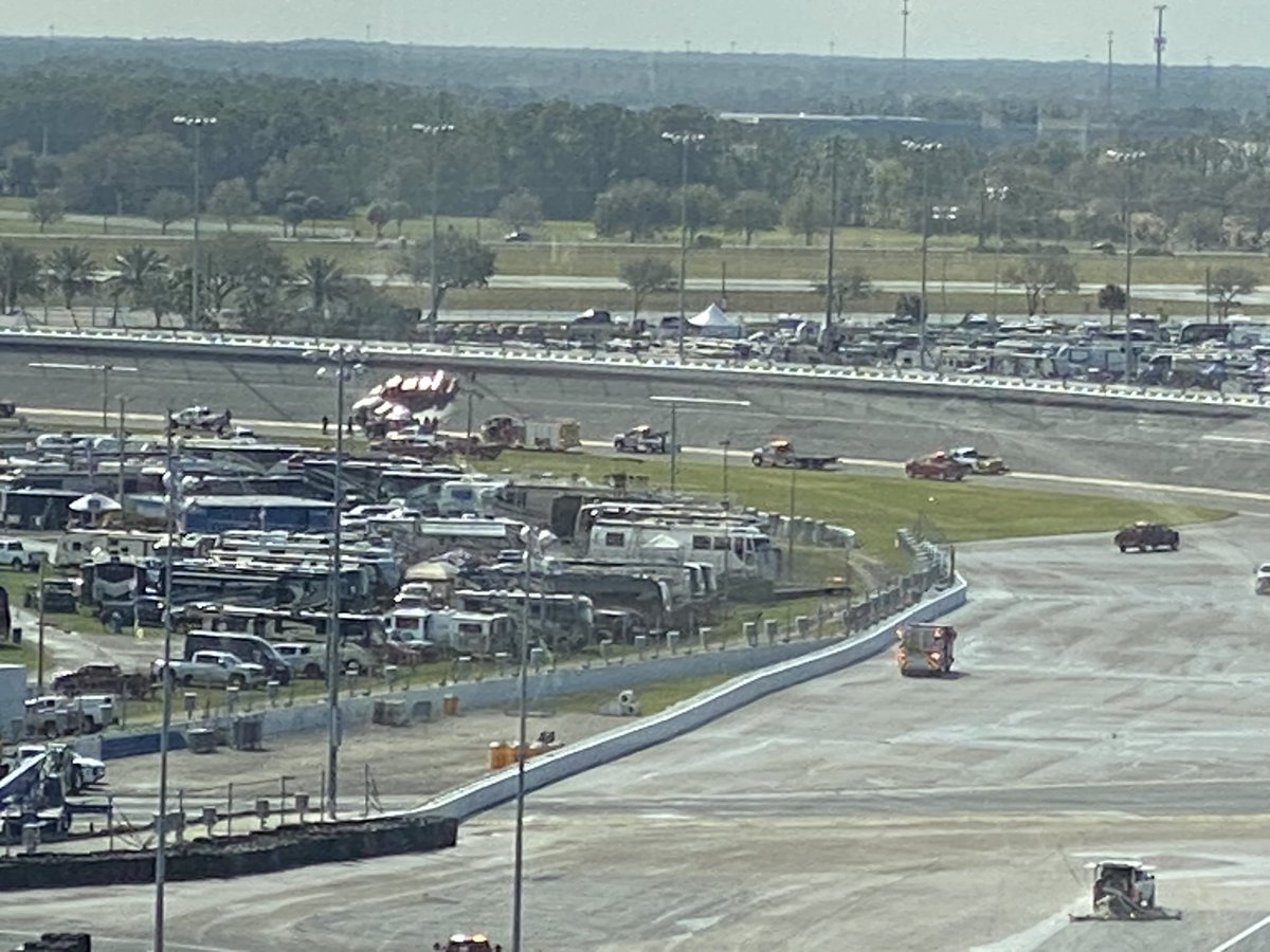 jeff_gluck's tweet photo. No injuries from an accident earlier when two jet drivers collided (one slid into another). NASCAR dispatched safety vehicles and put speedy dry in Turn 1 to clean the fuel spill. Looks like they’re washing the track now. https://t.co/LBc4vqJuI2