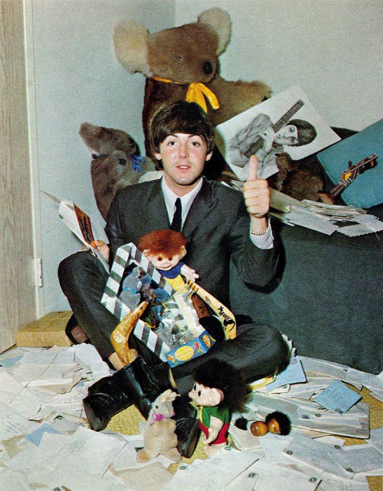 Paul McCartney with gifts from fans on his 22nd birthday in Sydney, Australia. 18 June, 1964.