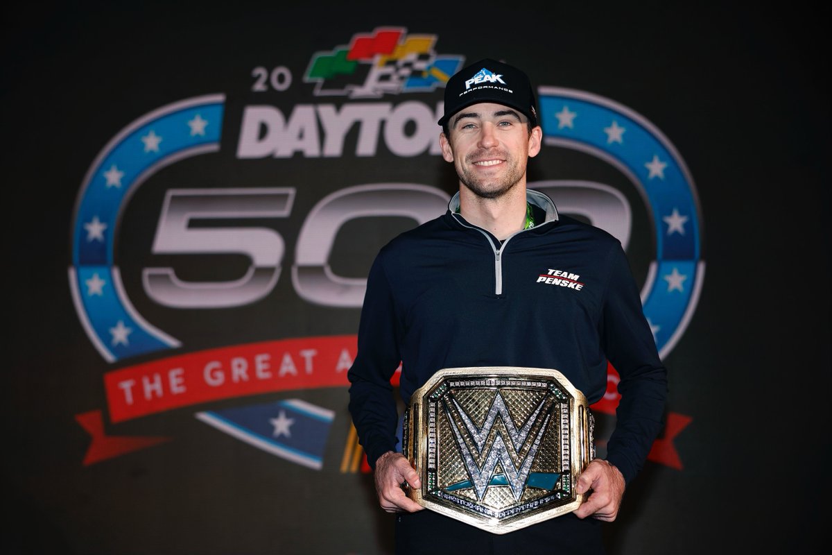 WWE's tweet image. A Golden Title to match a Championship Trophy! 

@Blaney found himself holding the #WWEGoldenTitle ahead of today's #Daytona500! 

#NASCARFullSpeed @netflix @NASCARONFOX