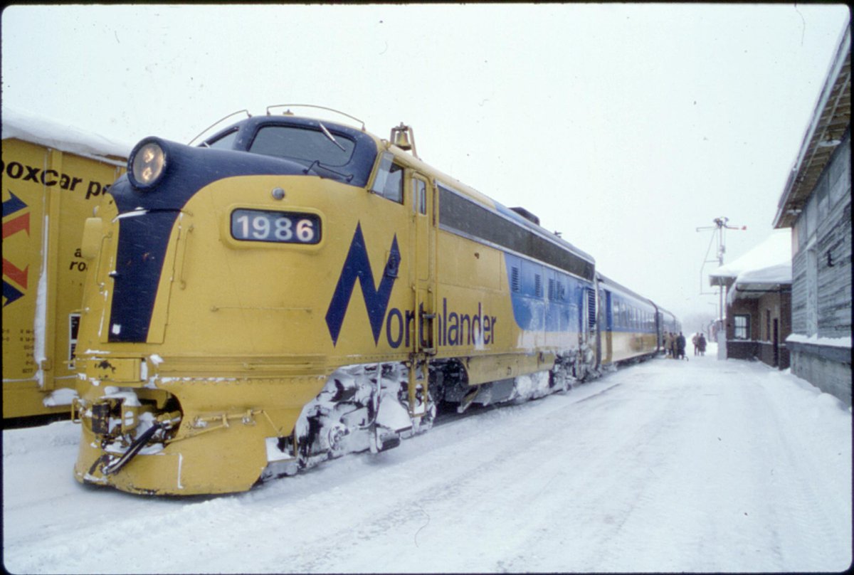 oldcanadaseries's tweet photo. A Ontario Northland train at a station in Ontario in 1975. credit: @ArchivesOntario https://t.co/2ZBUfLnKjB