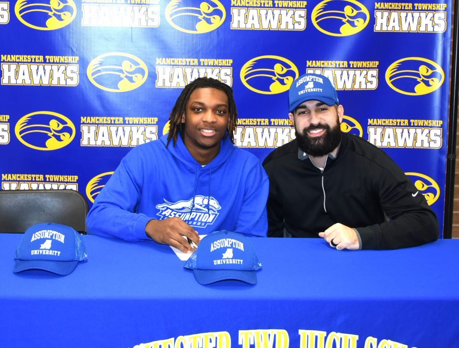 MTHS_Sports's tweet photo. Congratulations to Manny Swain for signing with DII Assumption University to continue his education and football career.  Here with Family, Coach Farrell, Teammates and Friends.  Go Greyhounds!!! @HSSportsNJ @ShoreSportsNet @APPSportsDesk @JSZ_Sports @AssumptionFB https://t.co/ShB6WAbG1w