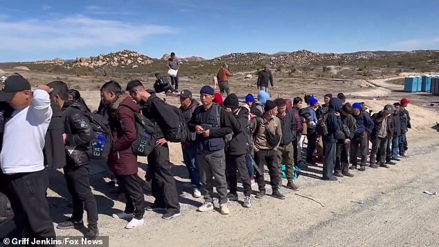 TonySeruga's tweet photo. Dozens of illegal Chinese migrants are rounded up in California border town along with Syrians and Turks - and tell the cameras: 'We're here to take the money'

Shocking images and video taken in California this weekend show Chinese migrants lined up at the border town of Jacumba and telling reporters shamelessly how they're here to 'take the money'. 
Dozens and dozens, possibly up to hundreds of migrants, crossed the international boundary, according to Griff Jenkins of Fox News, who recorded the footage.

'This is one of the largest groups of Chinese I have ever come across and there were two groups at the same time crossing in Jacumba, CA,' the correspondent tweeted last week.

https://t.co/RqIkpkrp5C