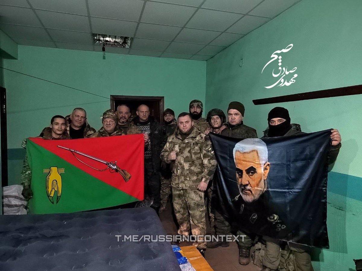 GreaterIran92's tweet image. A picture of martyr General Soleimani in the hands of Russian soldiers in Donetsk. #TheGeneral
