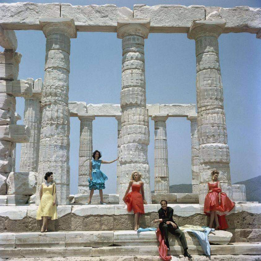 Dimis Kritsas and models posing at the Poseidon Temple, Sounion 1961. Photo by Slim Aarons