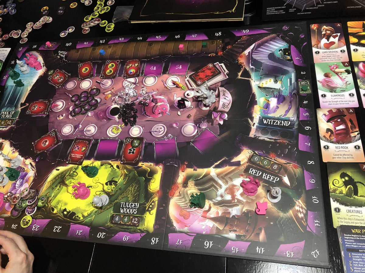 Our first game of Wonderland's War, I won 89-53 with the Cheshire Cat vs. Jabberwock.