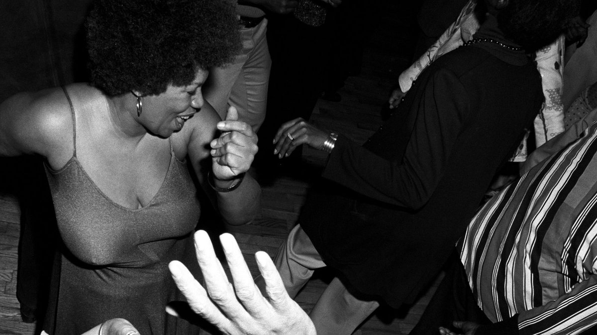 Toni Morrison dancing at a disco in New York City, 1974