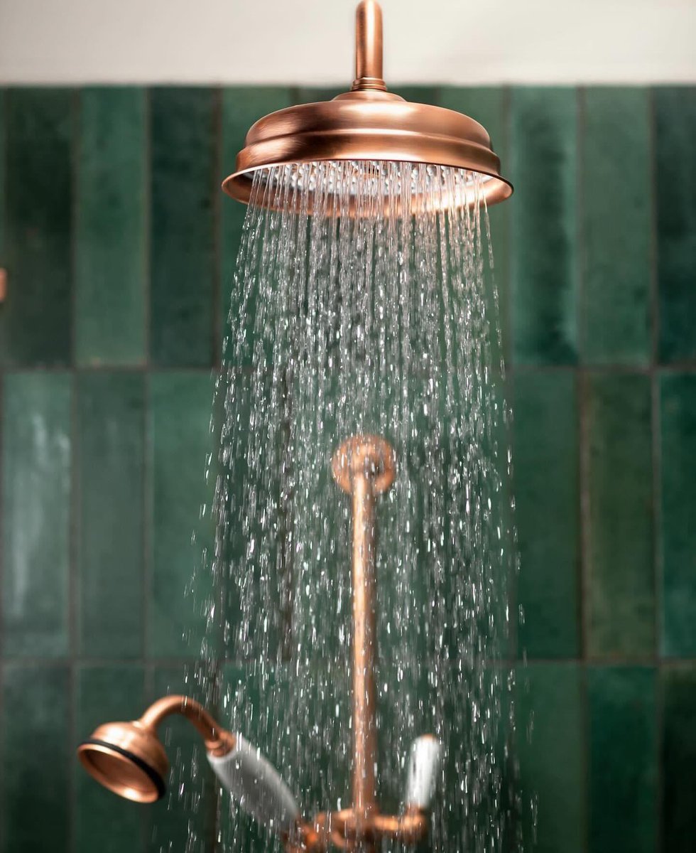 SwadlingUK's tweet photo. A luxurious showering area, featuring our classically beautiful Invincible Collection. 

Build your design around the generous 190mm Deluge on Adjustable Projection Arm and Hand Shower with striking White ceramics. Shown in Living Copper finish, which will change over time. https://t.co/mlK09BSljy